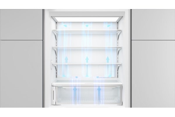 Sub-Zero Classic Series Full Size Refrigerator with arrows displaying the flow of its Split Climate temperature control between its top and bottom compartments