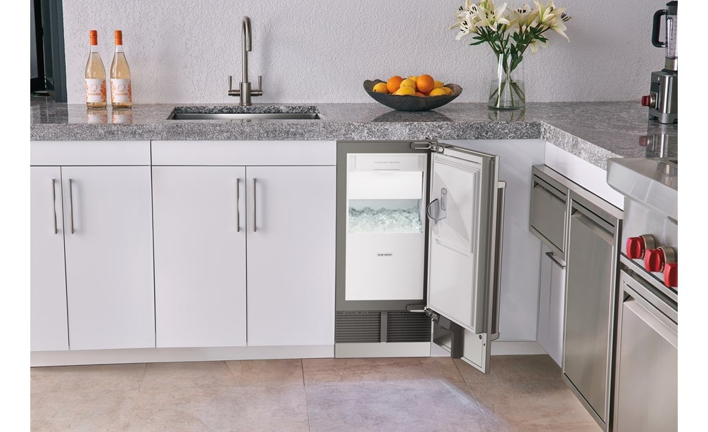 Elevate your luxury outdoor kitchen with a high end Sub-Zero 15" Indoor-Outdoor Clear Ice Maker featuring high quality materials.