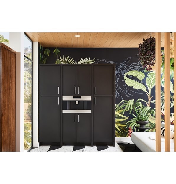 Wolf Built-In Coffee System shown installed seamlessly in black cabinetry