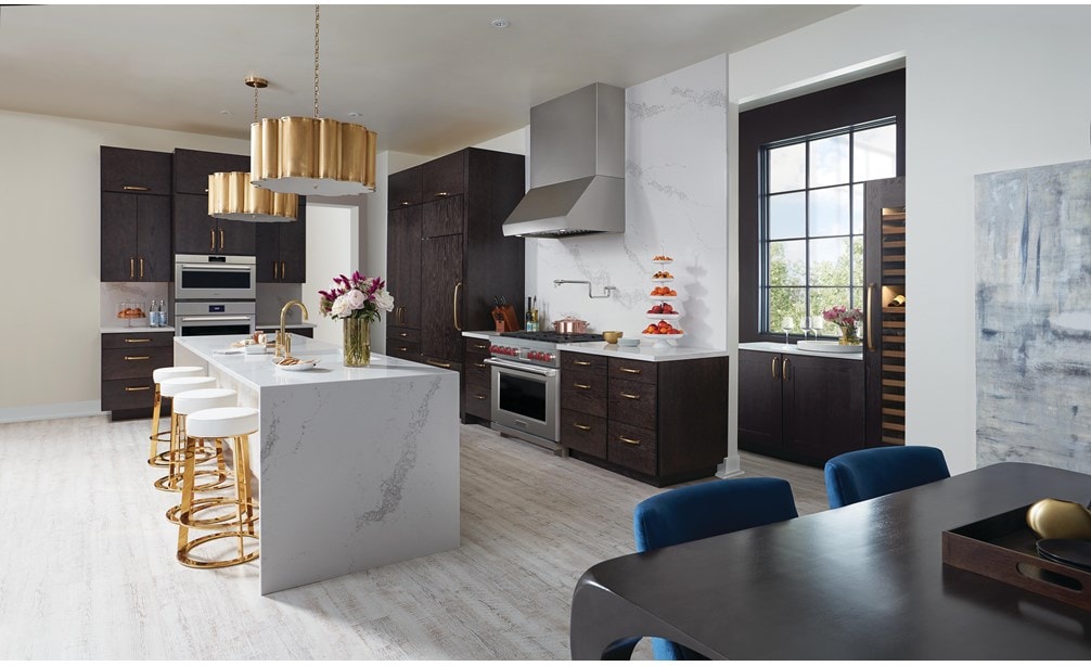 The Wolf 36" Professional Induction Range (IR365PE/S/PH) shown with Wolf 36" Pro Wall Hood - 24" Depth (PW362418)