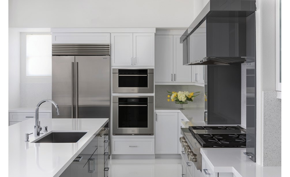 Wolf's 30" M Series Transitional Speed Oven - SPO3050TM/S/T with a Classic refrigerator and Wolf SRT