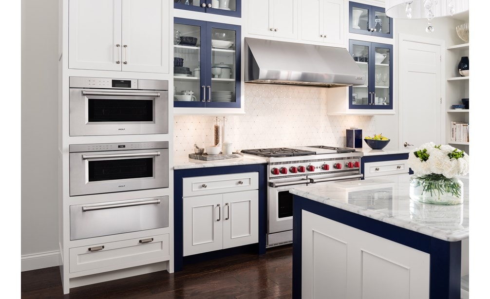 The Wolf 30" M Series Professional Convection Steam Oven (CSO30PM/S/PH) shown with Wolf 30" Warming Drawer (WWD30)