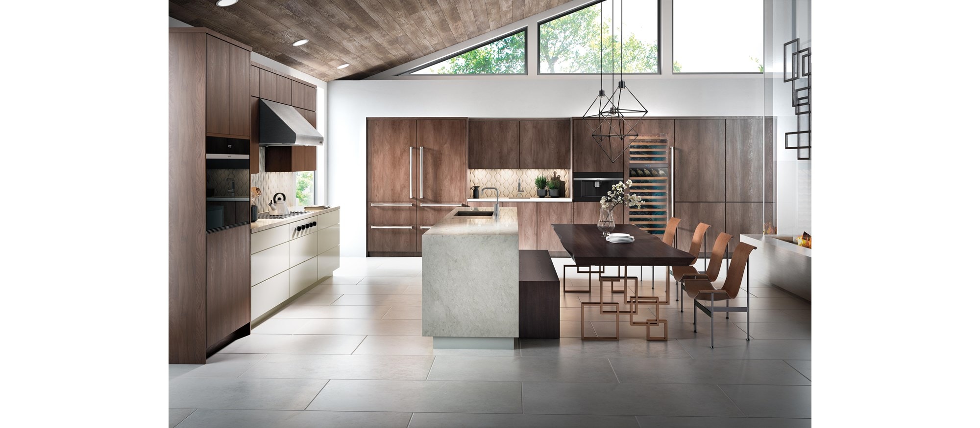 Hotte murale Wolf 36 po Pro - profondeur 27 po (PW362718) mise en valeur dans une grande cuisine de luxe dotée d'armoires en panneaux de bois lisses