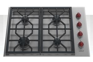 Top view of Wolf Gas Cooktop displaying dual-stacked, sealed gas burners for precise high heat.